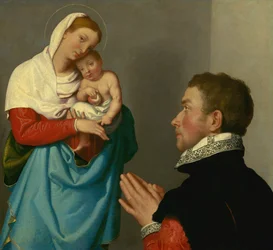 Een heer in aanbidding voor de Madonna